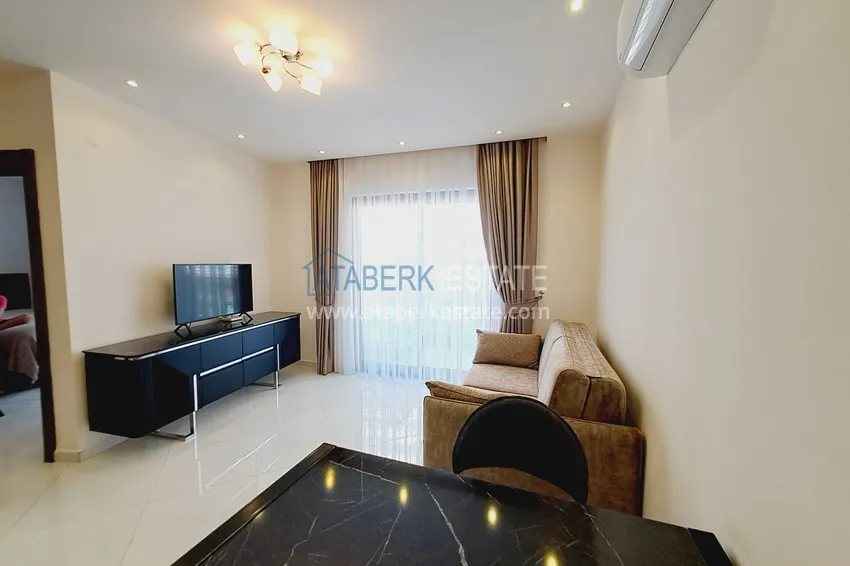 Purchase  Stylish apartment 1+1 with new furniture in a complex with hotel infrastructure - Alanya, Mahmutlar 6 