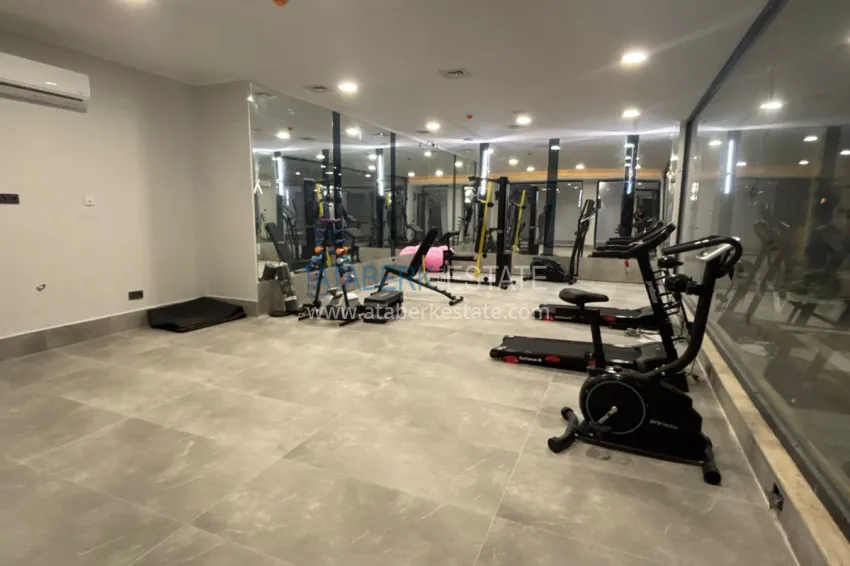 Modern 1+1 apartment with panoramic views in the heart of Mahmutlar - just 120 meters from the beach. 11 