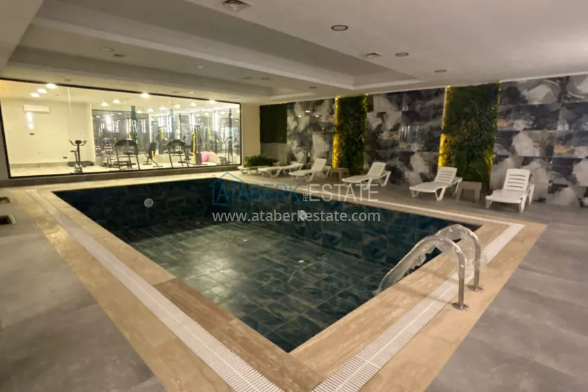 Modern 1+1 apartment with panoramic views in the heart of Mahmutlar - just 120 meters from the beach. 12 