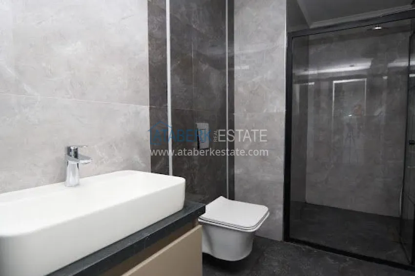 Purchase Modern 1+1 apartment with panoramic views in the heart of Mahmutlar - just 120 meters from the beach. 9 