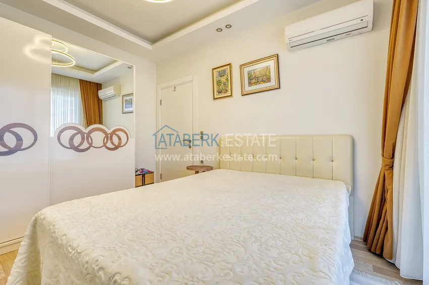 Purchase  Apartment in Mahmutlar, one bedroom apartment with furniture and open mountain view 11 
