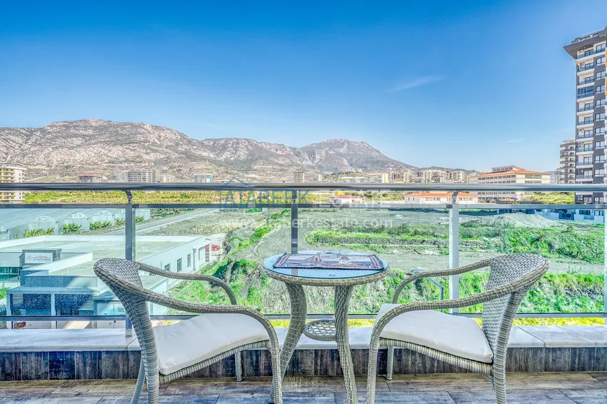 Purchase  Apartment in Mahmutlar, one bedroom apartment with furniture and open mountain view 15 