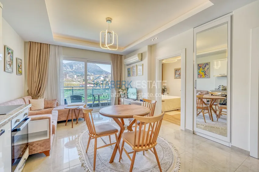 Purchase  Apartment in Mahmutlar, one bedroom apartment with furniture and open mountain view 2 