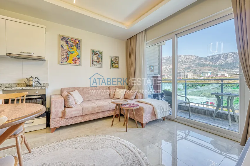 Purchase  Apartment in Mahmutlar, one bedroom apartment with furniture and open mountain view 3 