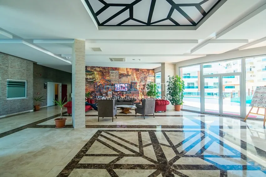 1+1 apartment with furniture and mountain views in a luxury complex — Alanya, Mahmutlar 7 