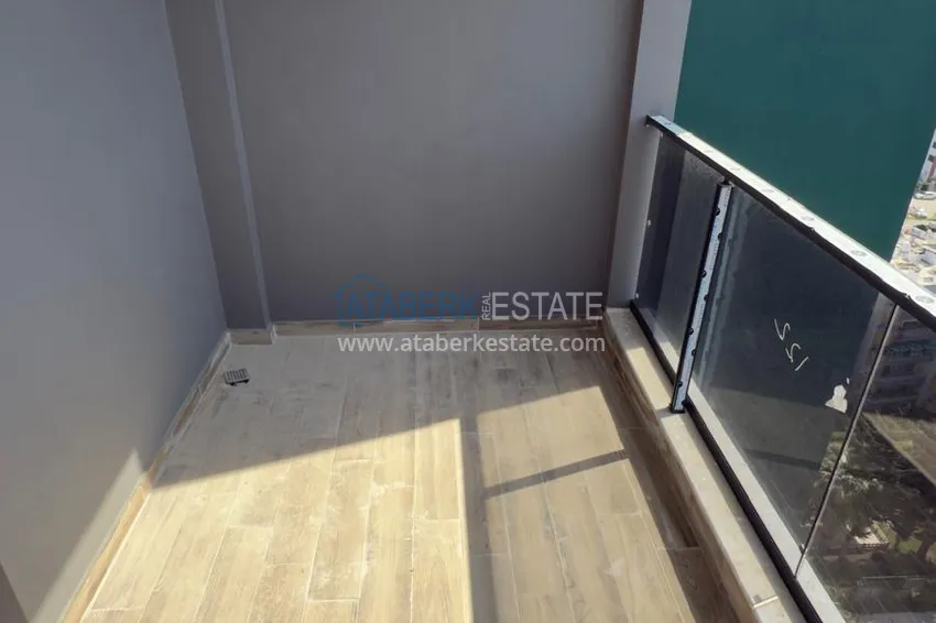 Purchase  1+1 apartment with sea view and quality finishes - Mersin, Tezje district 9 