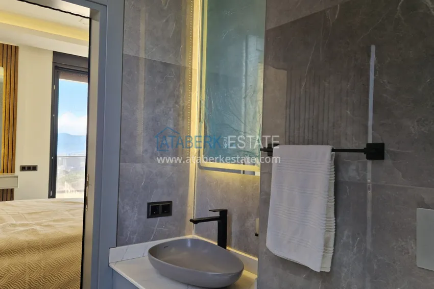 Purchase  View three-storey furnished villa in Kargycak, Alanya - suitable for citizenship 15 