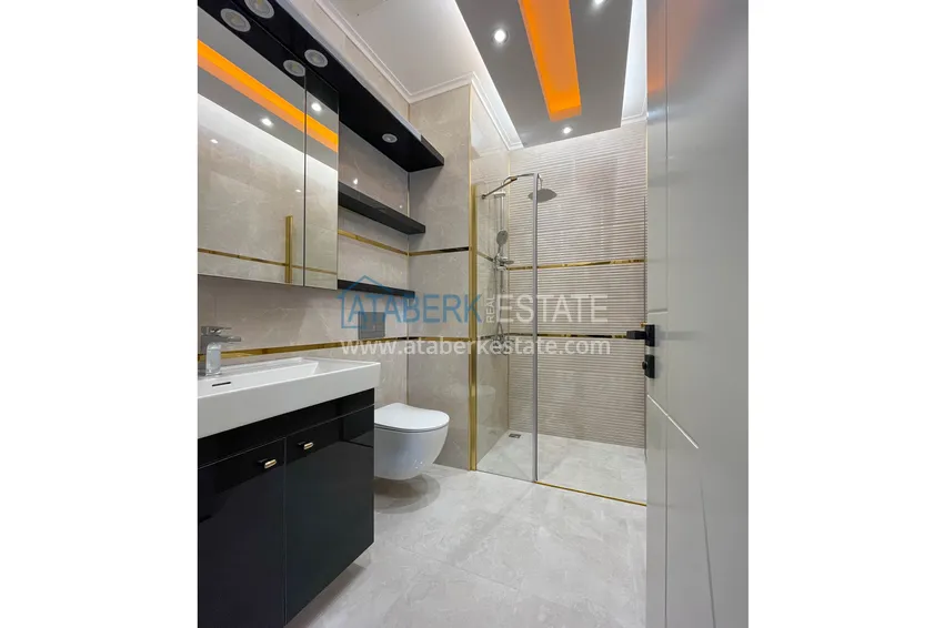 Purchase  Stylish 2+1 furnished apartment in Mahmutlar - a prestigious complex with infrastructure 15 