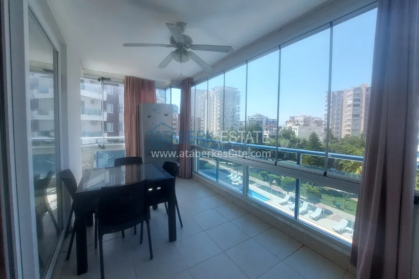Purchase  Apartment 2+1 with furniture and two glazed balconies 450 meters from the sea - Mahmutlar 11 