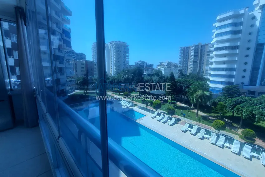 Purchase  Apartment 2+1 with furniture and two glazed balconies 450 meters from the sea - Mahmutlar 13 