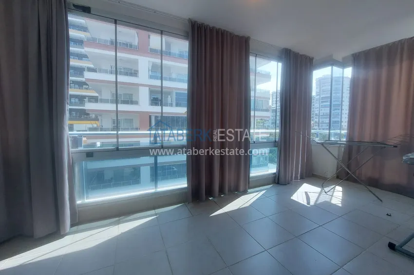 Purchase  Apartment 2+1 with furniture and two glazed balconies 450 meters from the sea - Mahmutlar 15 