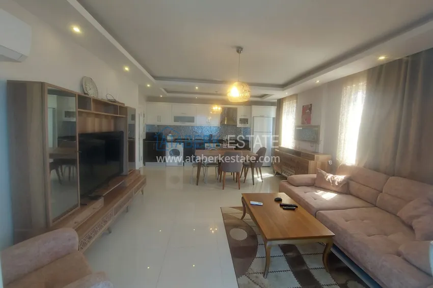 Purchase  Apartment 2+1 with furniture and two glazed balconies 450 meters from the sea - Mahmutlar 5 