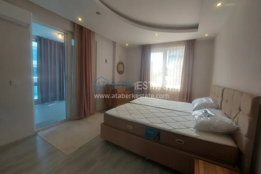 Purchase  Apartment 2+1 with furniture and two glazed balconies 450 meters from the sea - Mahmutlar 9 