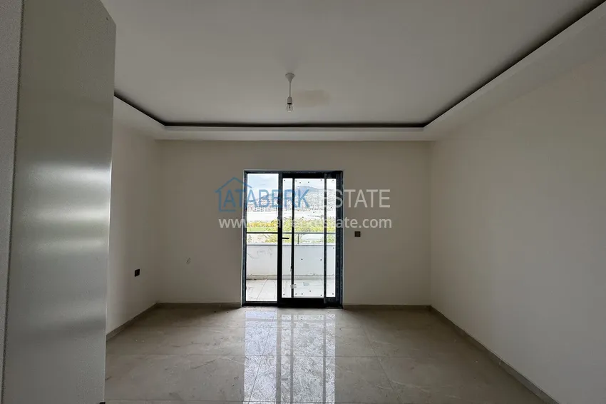 Purchase 2+1 penthouse with sea and mountain views in Demirtas — primary property in a small apartment complex 10 