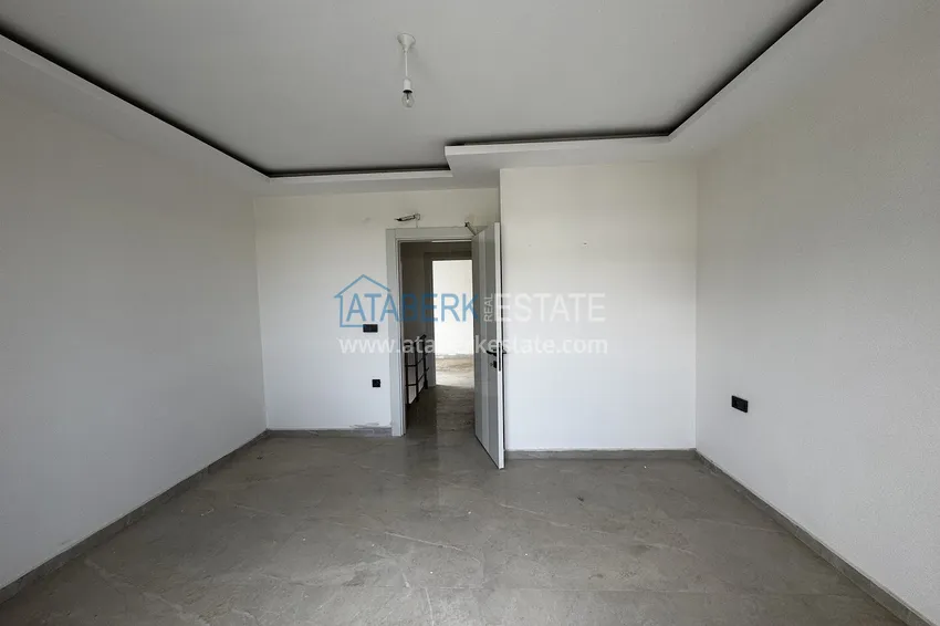 Purchase 2+1 penthouse with sea and mountain views in Demirtas — primary property in a small apartment complex 11 