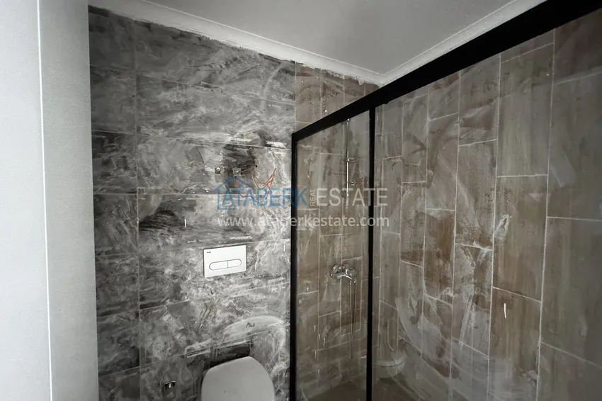 Purchase 2+1 penthouse with sea and mountain views in Demirtas — primary property in a small apartment complex 12 