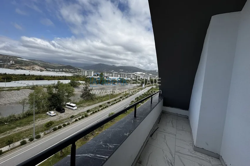 Purchase 2+1 penthouse with sea and mountain views in Demirtas — primary property in a small apartment complex 13 