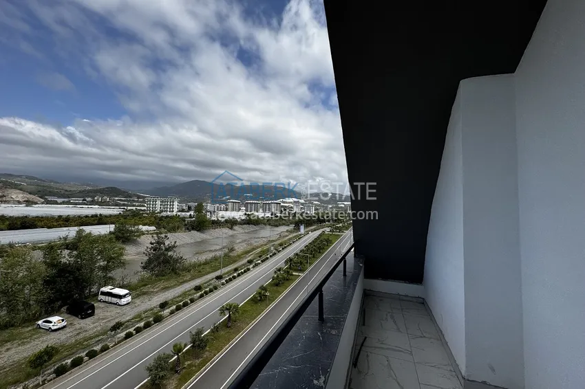 Purchase 2+1 penthouse with sea and mountain views in Demirtas — primary property in a small apartment complex 14 