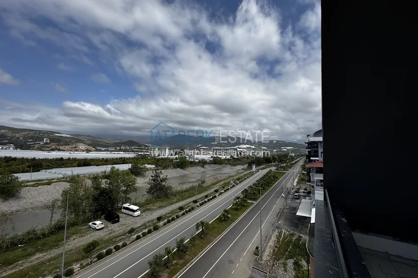 Purchase 2+1 penthouse with sea and mountain views in Demirtas — primary property in a small apartment complex 15 