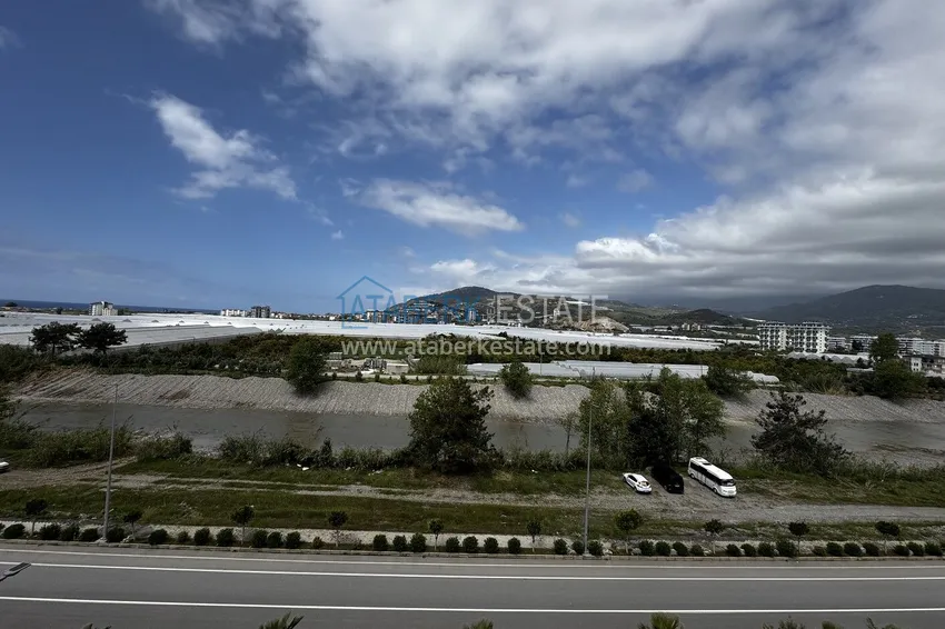 Purchase 2+1 penthouse with sea and mountain views in Demirtas — primary property in a small apartment complex 16 