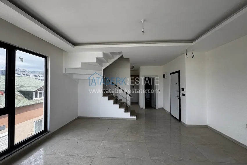 Purchase 2+1 penthouse with sea and mountain views in Demirtas — primary property in a small apartment complex 1 