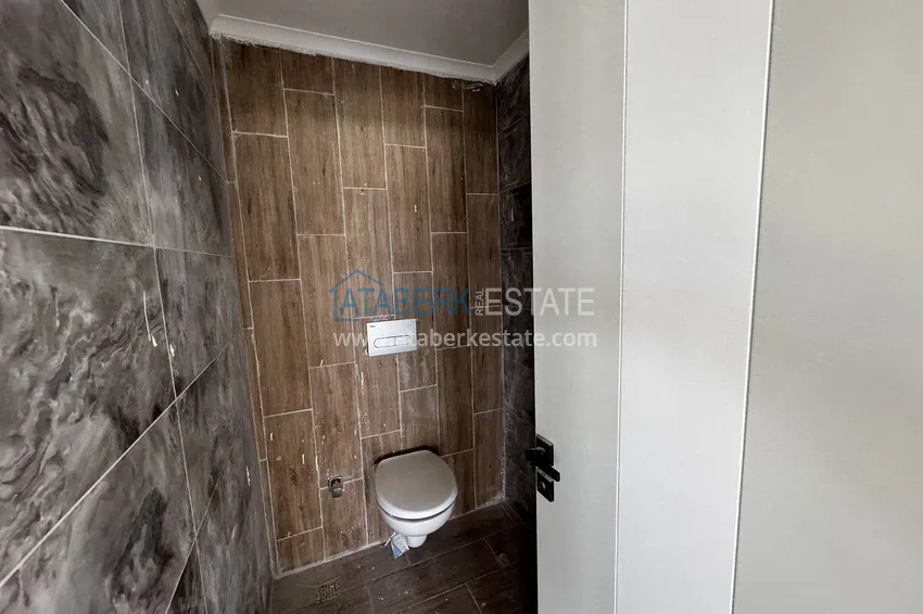 Purchase 2+1 penthouse with sea and mountain views in Demirtas — primary property in a small apartment complex 5 