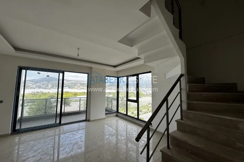 Purchase 2+1 penthouse with sea and mountain views in Demirtas — primary property in a small apartment complex 6 