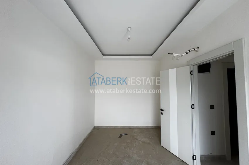 Purchase 2+1 penthouse with sea and mountain views in Demirtas — primary property in a small apartment complex 9 