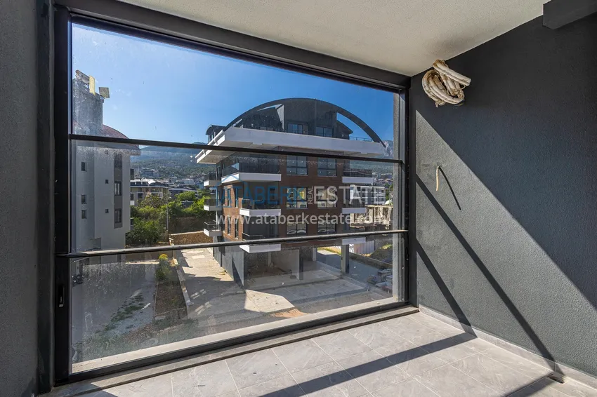 Purchase  1+1 apartment in Alanya, Oba district — primary property in a comfort-class complex  14 