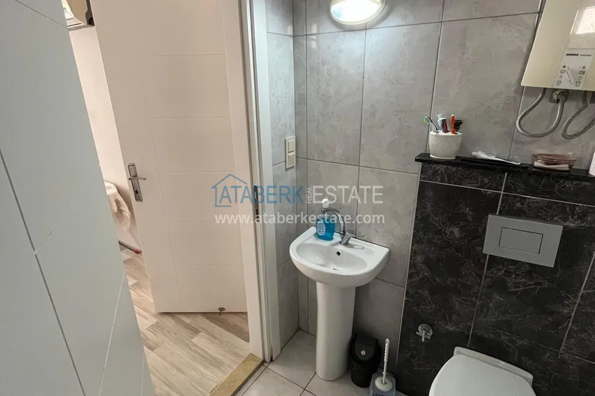 Purchase Furnished two-bedroom apartment in a cozy complex - Mahmutlar, Alanya 15 