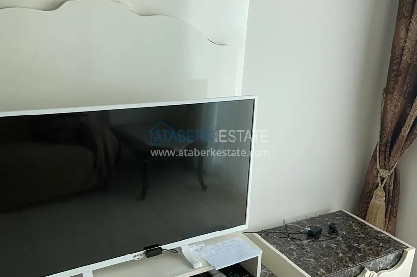 Purchase Furnished 1+1 apartment with warm floors and a glazed balcony — Mahmutlar, Alanya 2 