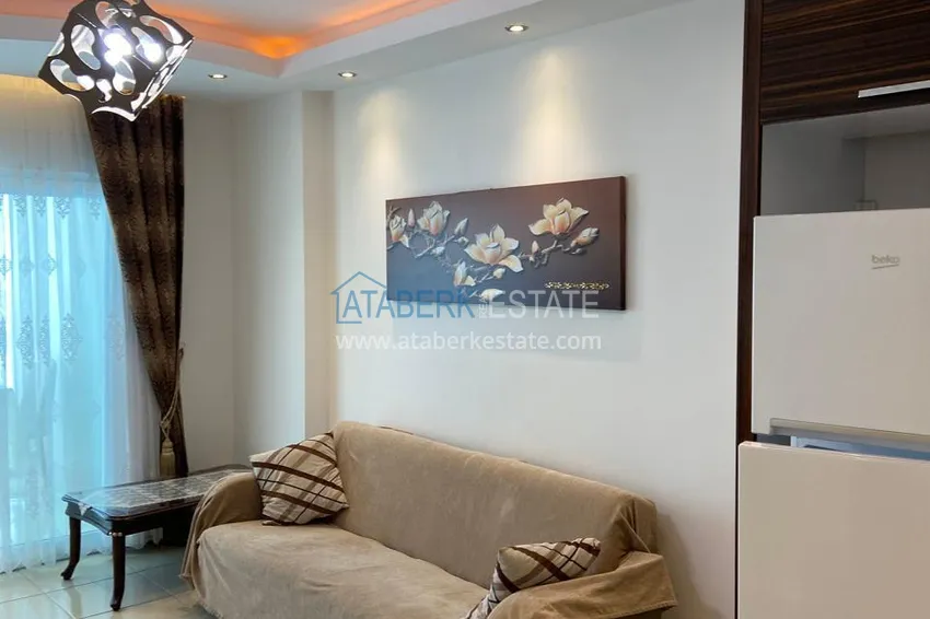 Purchase Furnished 1+1 apartment with warm floors and a glazed balcony — Mahmutlar, Alanya 3 