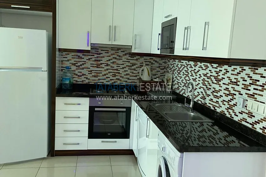 Purchase Furnished 1+1 apartment with warm floors and a glazed balcony — Mahmutlar, Alanya 4 