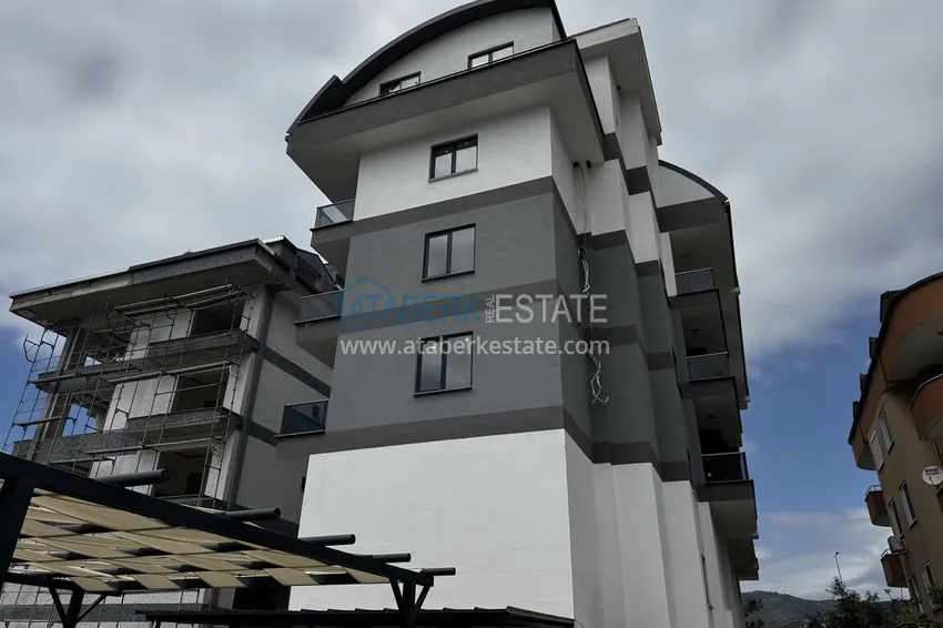 2+1 penthouse with sea and mountain views in Demirtas — primary property in a small apartment complex 4 