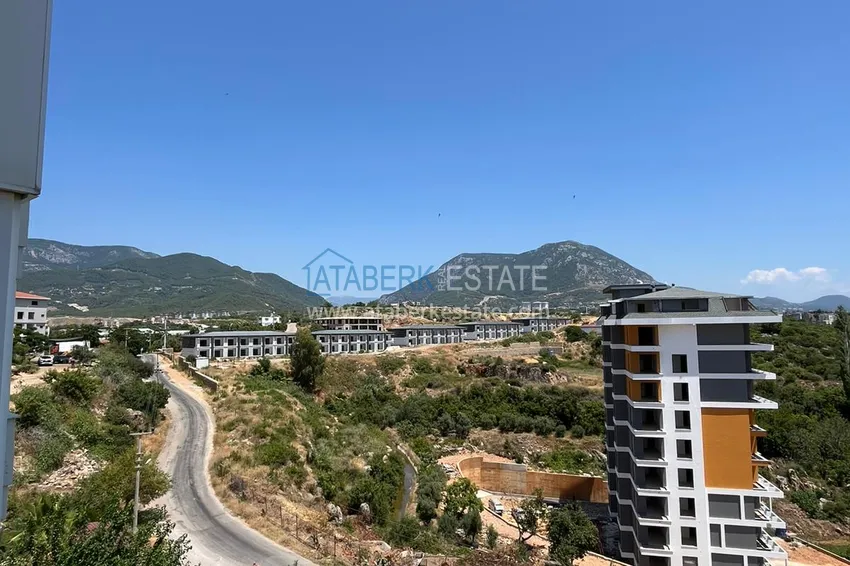Purchase  Alanya secondary market - 1+1 apartment with furniture and mountain views, Tosmur district. Suitable for a residence permit 12 