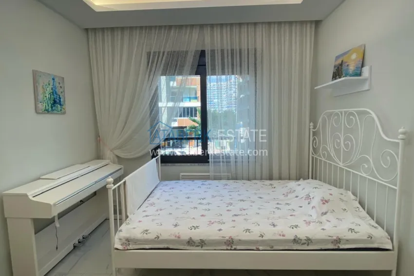 Purchase Furnished two-bedroom apartment in the center of Mahmutlar, just 200 meters from the beach 25 