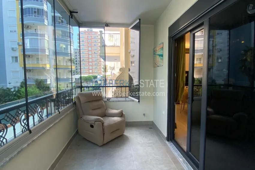 Purchase Furnished two-bedroom apartment in the center of Mahmutlar, just 200 meters from the beach 28 