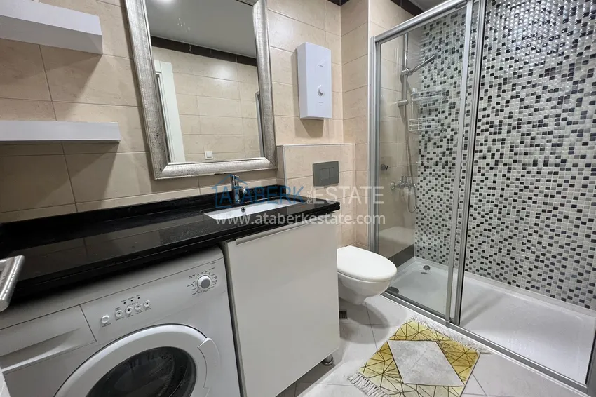 Purchase  1+1 apartment with furniture and a glazed balcony in Oba, Alanya - 5 minutes from the sea 13 