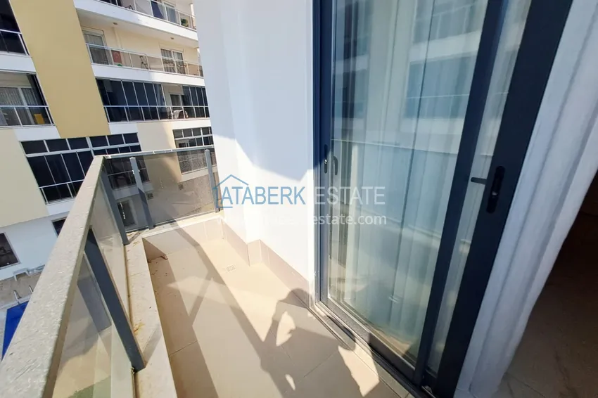 Purchase 1+1 apartment with two turnkey balconies in Mahmutlar - just 500 m from the sea 12 