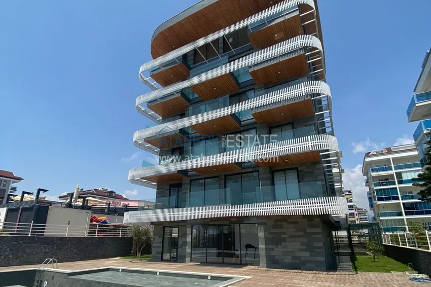 Turnkey 1+1 apartment with sea view on the beachfront — Alanya, Kestel 2 