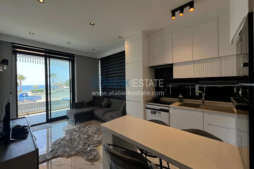 Purchase  Turnkey 1+1 apartment with sea view on the beachfront — Alanya, Kestel 3 
