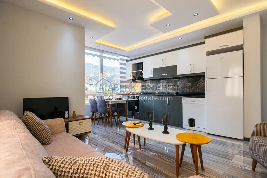 Purchase  Ready-made housing in the center of Alanya, for a residence permit — a one-bedroom apartment with furniture and mountain views 5 