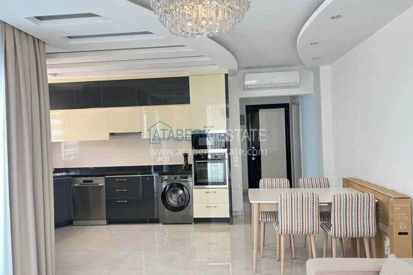 Purchase Turnkey one-bedroom apartment with two glazed balconies in a prestigious complex - Mahmutlar, Alanya 2