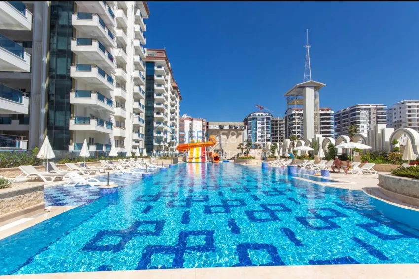 Turnkey one-bedroom apartment with two glazed balconies in a prestigious complex - Mahmutlar, Alanya 4