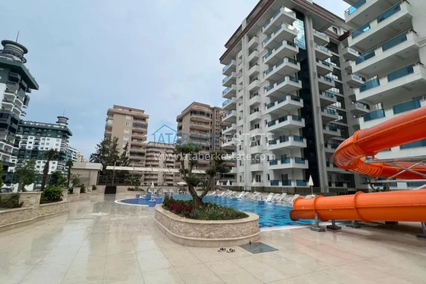 Turnkey one-bedroom apartment with two glazed balconies in a prestigious complex - Mahmutlar, Alanya 5