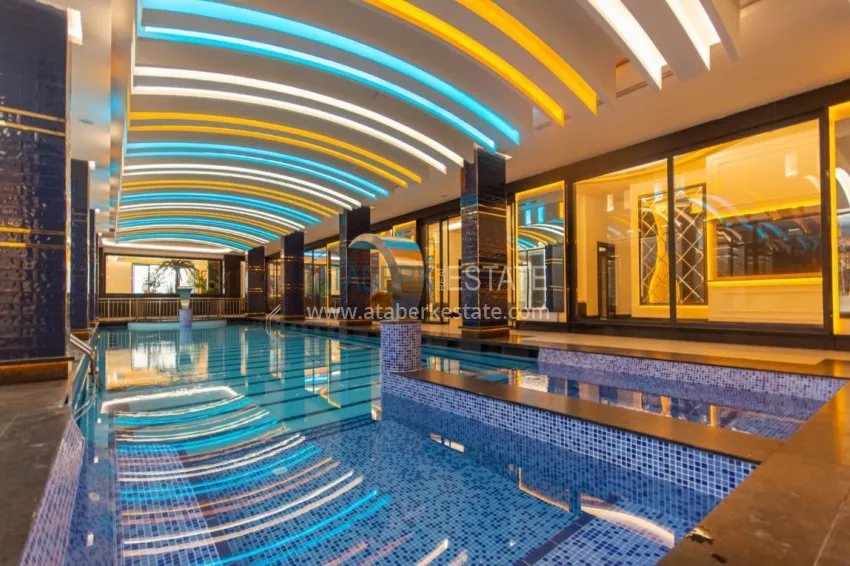 Turnkey one-bedroom apartment with two glazed balconies in a prestigious complex - Mahmutlar, Alanya 13