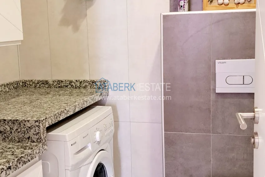 Purchase  2+1 apartment with a separate kitchen and a glazed balcony in the center of Alanya — furniture suitable for a residence permit 11 