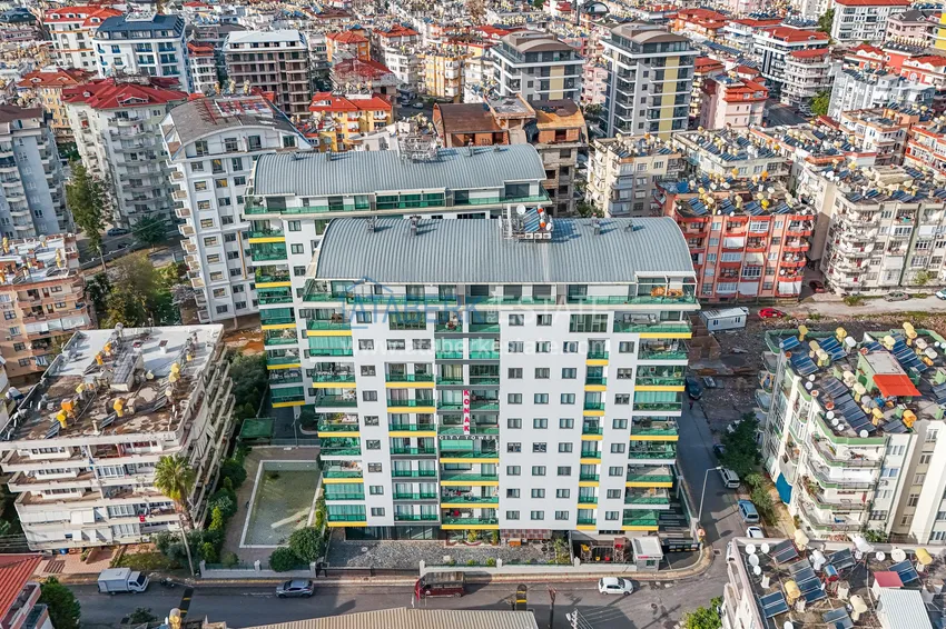 2+1 apartment with a separate kitchen and a glazed balcony in the center of Alanya — furniture suitable for a residence permit 4 