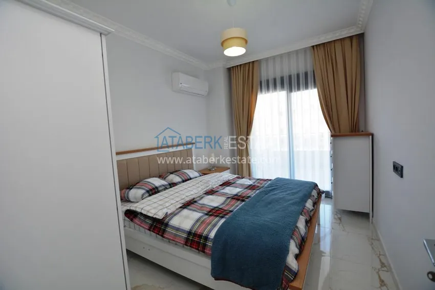 Purchase 2+1 apartment with furniture and partial sea view in Mahmutlar — sale from owner 10