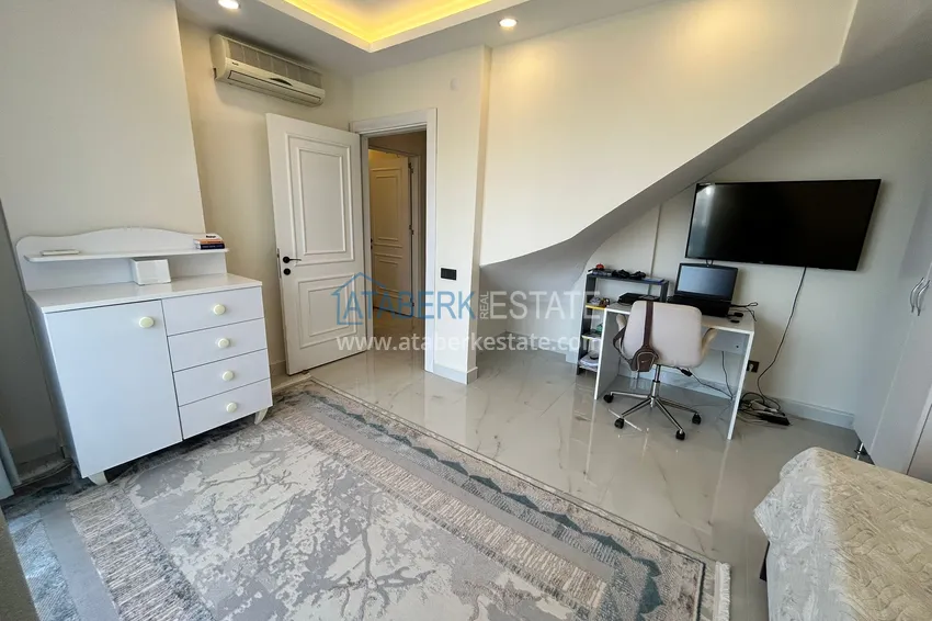 Purchase  2+1 penthouse duplex with sea and mountain views in the center of Alanya 13 